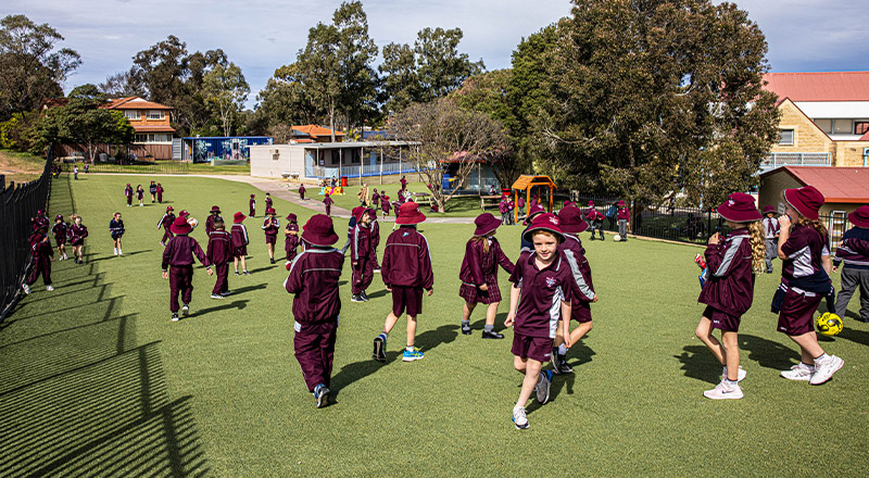 Students playing together in the playground at Mary Immaculate Primary School Quakers Hill