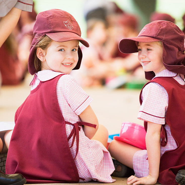 Students smiling at the camera in 2006 at Mary Immaculate Primary School Quakers Hill