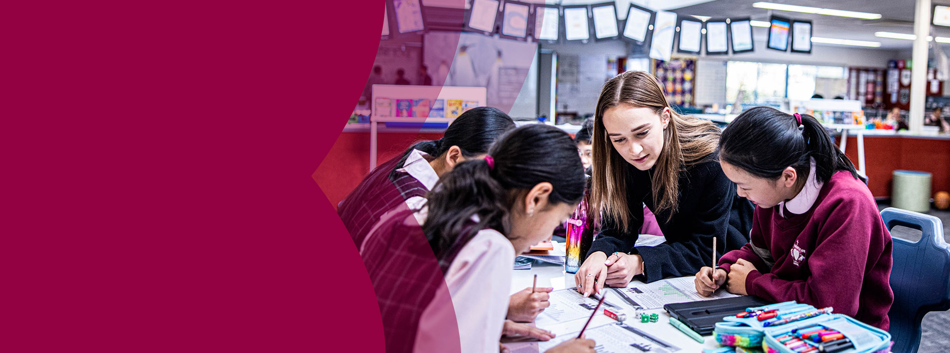 Teacher with her students in the classroom at Mary Immaculate Primary School Quakers Hill