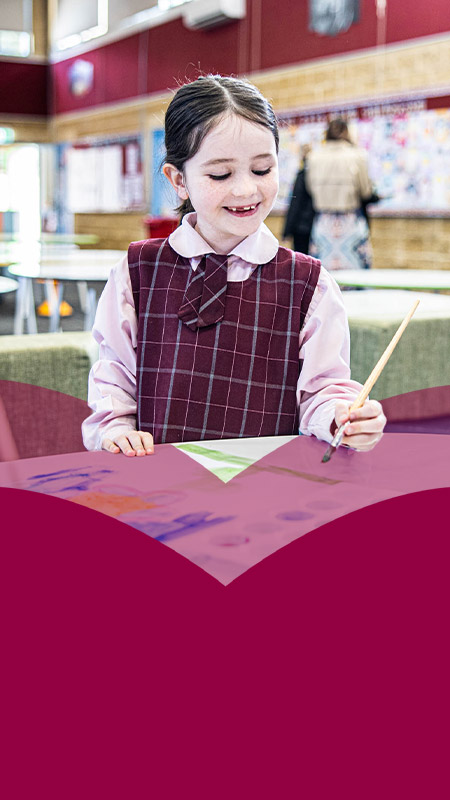 Students working on their paintings together at Mary Immaculate Primary School Quakers Hill