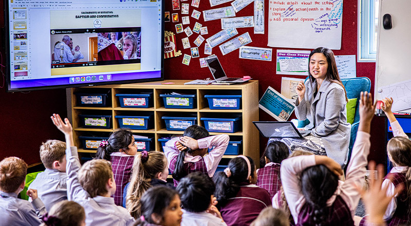 Teacher in front of her class at Mary Immaculate Primary School Quakers Hill