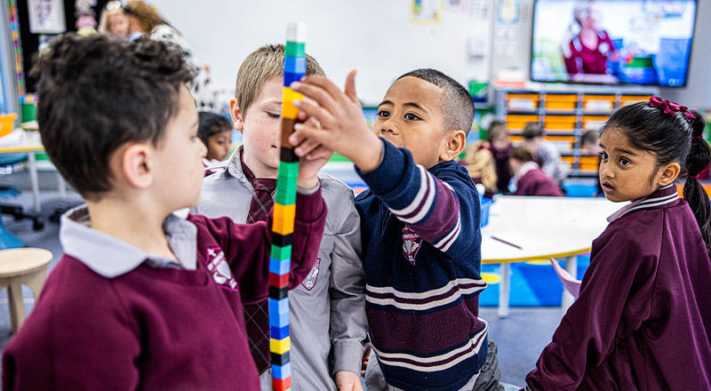 Students building blocks in the classroom at Mary Immaculate Primary School Quakers Hill