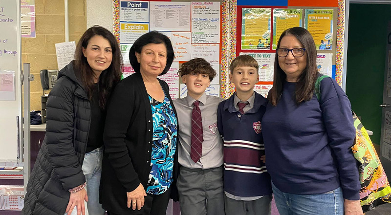 Students with their mums and grandmothers at a school event at Mary Immaculate Primary School Quakers Hill