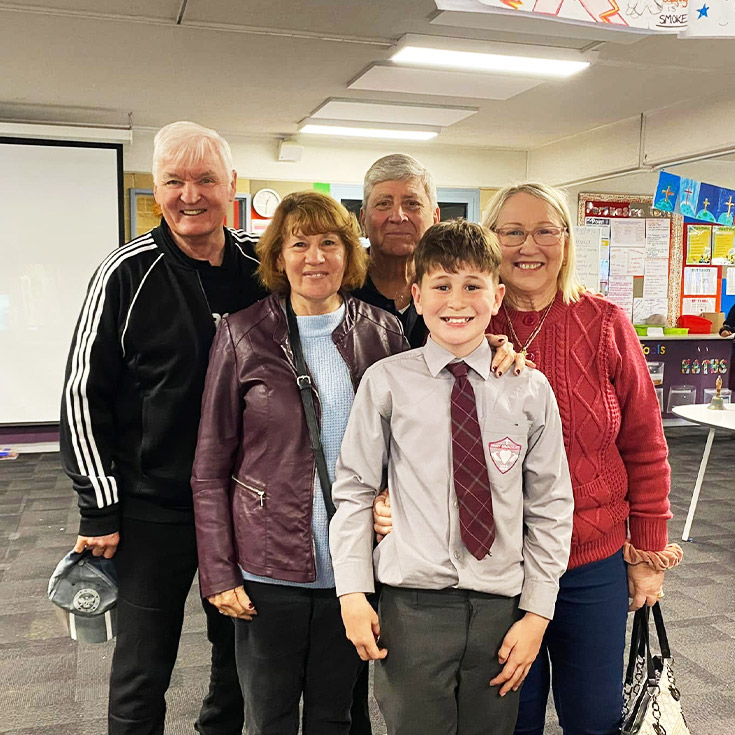 Student with his grandparents at a school event at Mary Immaculate Primary School Quakers Hill