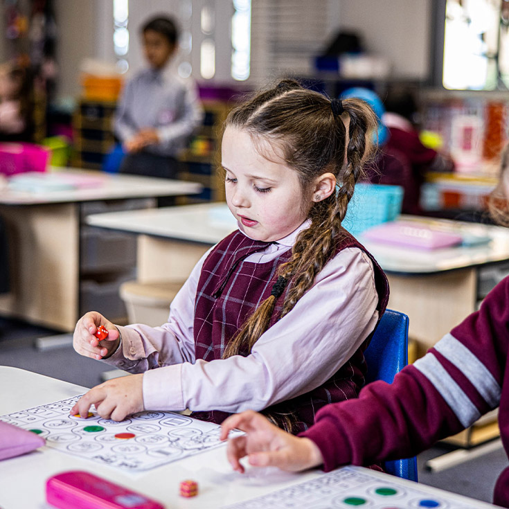 Student counting in the classroom at Mary Immaculate Primary School Quakers Hill