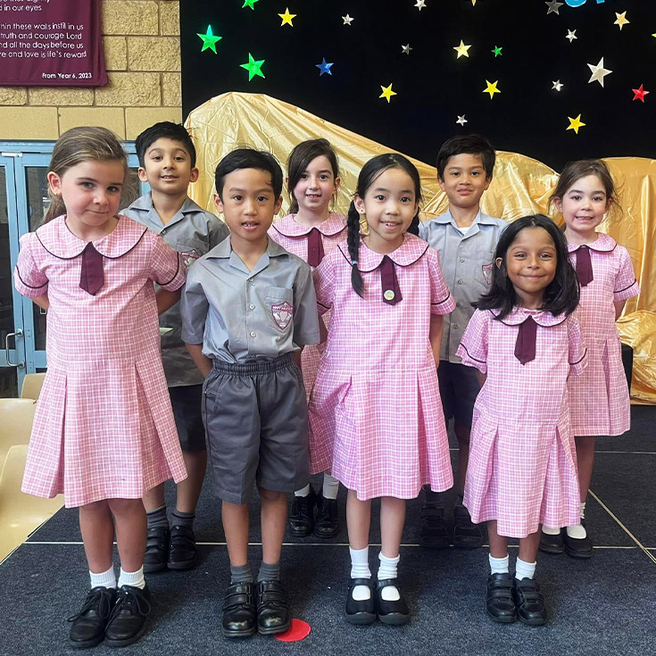 Students standing together for merit awards at Mary Immaculate Primary School Quakers Hill