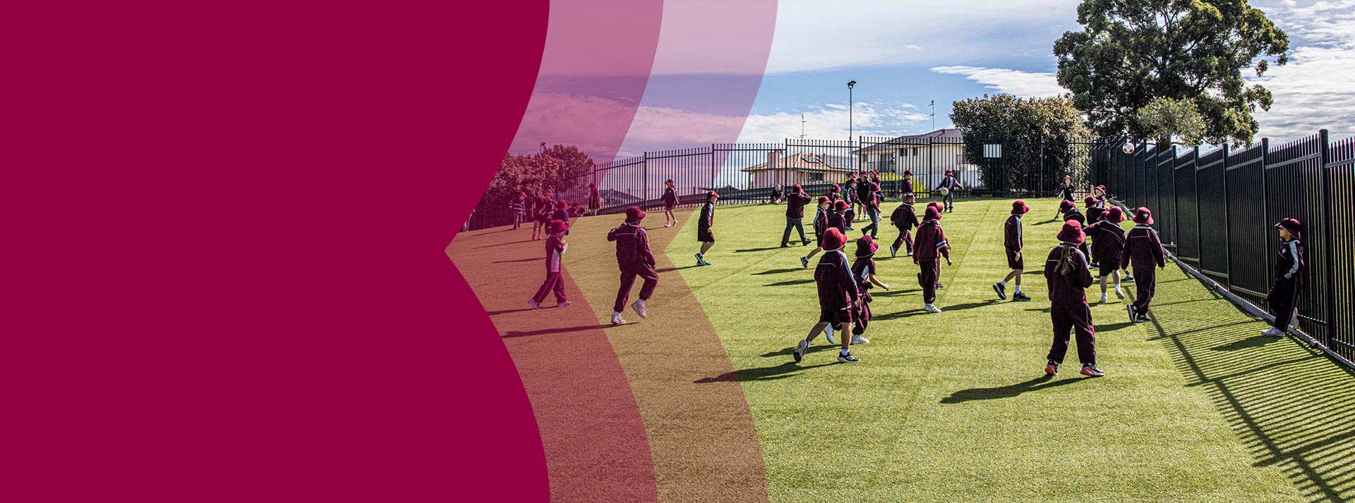 Mary Immaculate Primary Quakers Hill students playing on outdoor astroturfed sports field